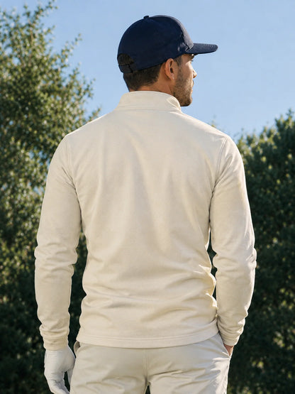 Golf-Pullover aus Funktionsmaterial in Elfenbeincreme mit einfarbigem Design und Viertelreißverschluss