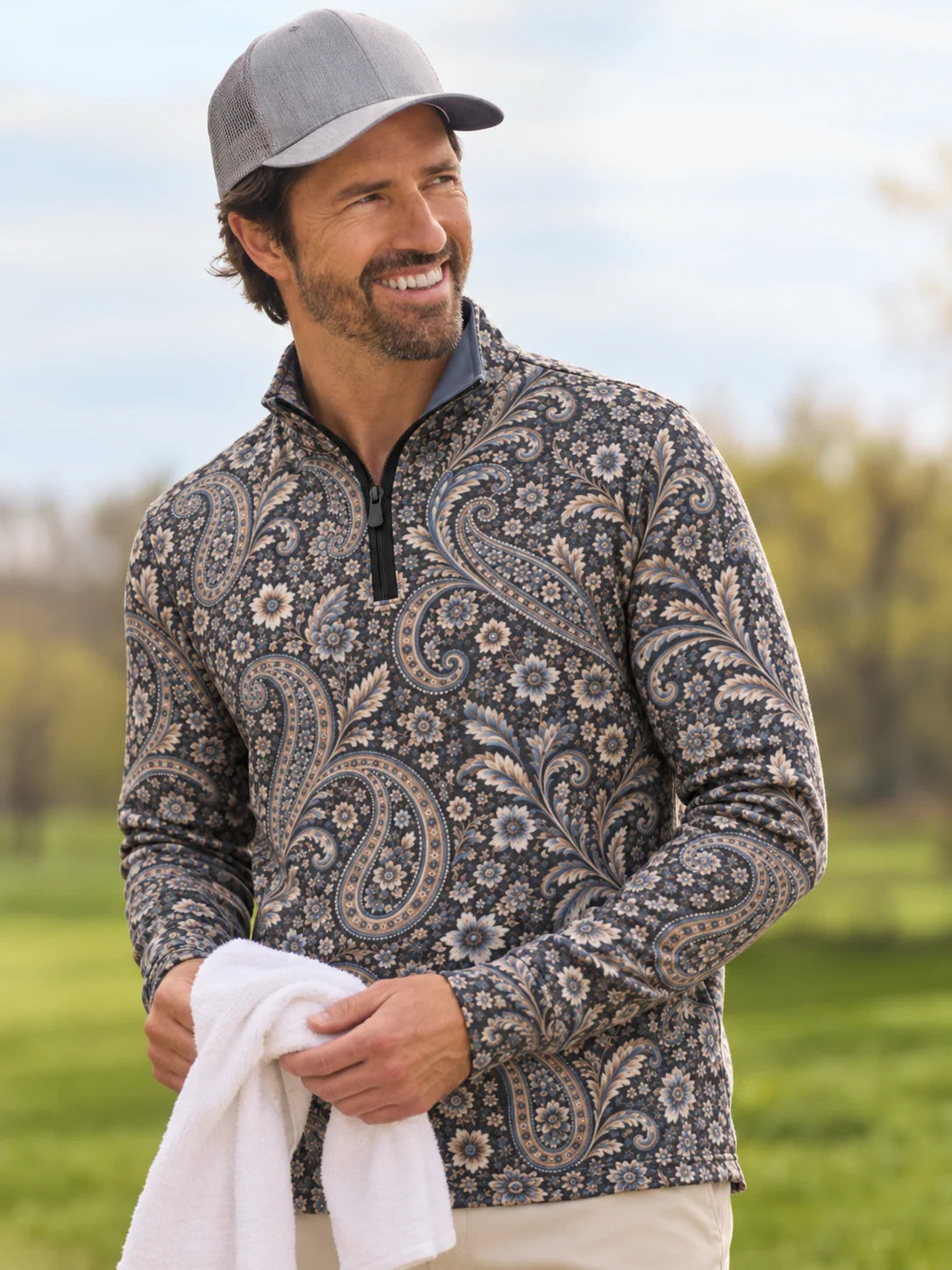 Blauer Golfpullover mit floralem Paisley-Muster, Funktionsmaterial und Viertelreißverschluss