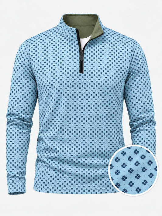 Performance-Golfpullover in Himmelblau mit Blumenmuster und Viertelreißverschluss