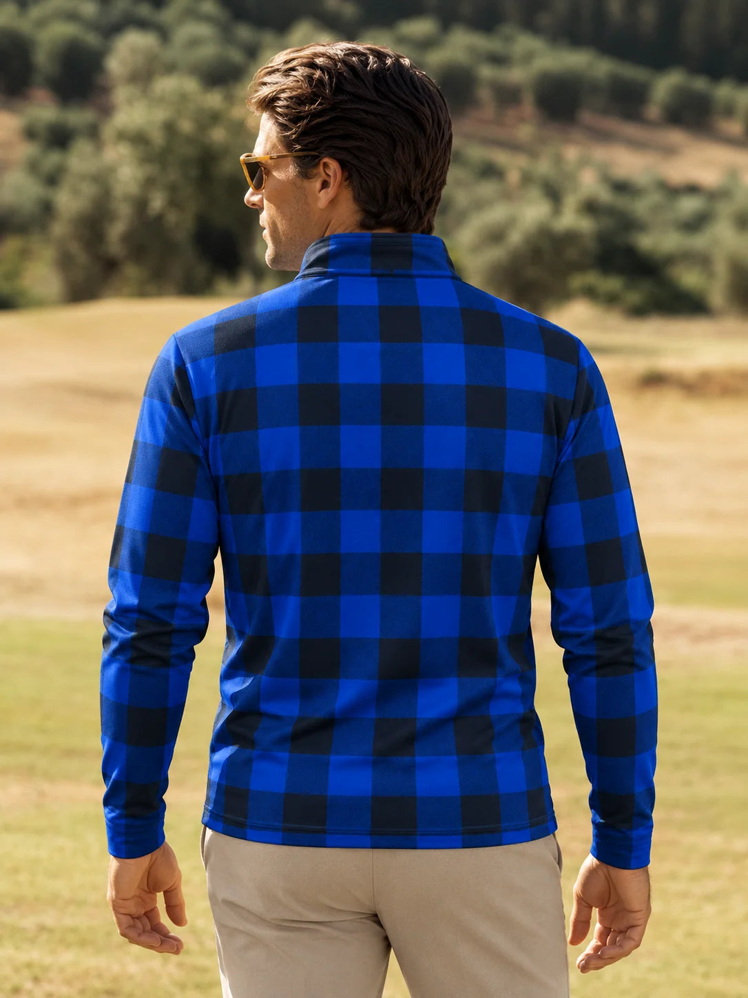 ClubBorne Golf-Pullover mit blauem Büffelkaro und Viertelreißverschluss aus Funktionsmaterial