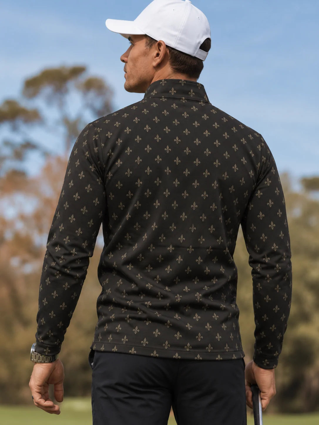 Golfpullover mit Lilienornament-Muster in Obsidianschwarz, Funktionsmaterial und Viertelreißverschluss