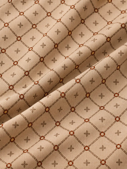 Beigefarbener Performance-Golfpullover mit geometrischem Muster und Viertelreißverschluss