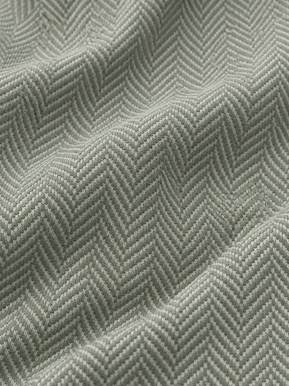 Salbeigrünes Performance-Golfpoloshirt mit Chevron-Muster