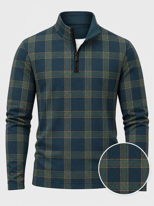 Golf-Pullover aus Funktionsmaterial in tiefem Blaugrün mit klassischem Heritage-Karomuster und Viertelreißverschluss