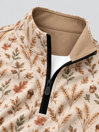 Cremefarbener Golfpullover aus Funktionsmaterial mit herbstlichem Blumenmuster und kurzem Reißverschluss