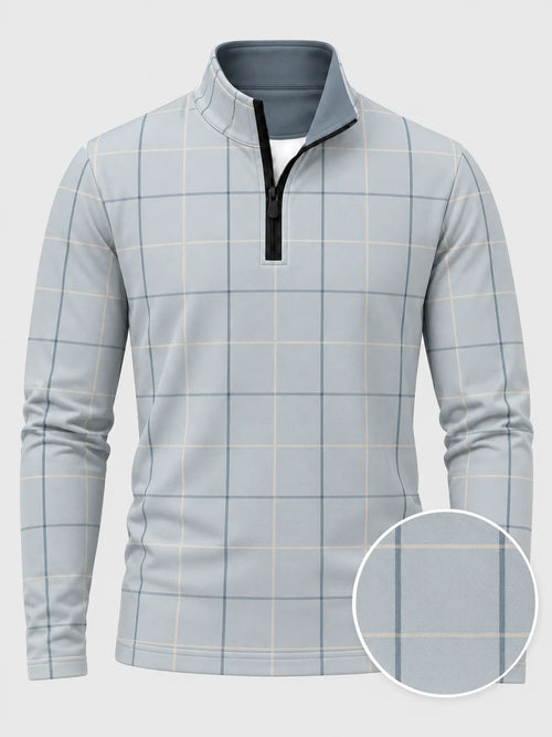 Golfpullover in Puderblau mit Fensterkaromuster und Viertelreißverschluss