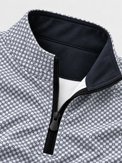 Performance-Golfpullover mit schwarz-weißem geometrischem Muster und Viertelreißverschluss