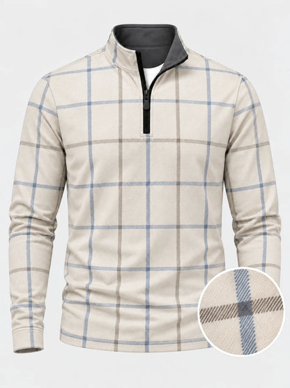 Cremefarbener Golfpullover aus Funktionsmaterial mit blauem Karomuster und kurzem Reißverschluss